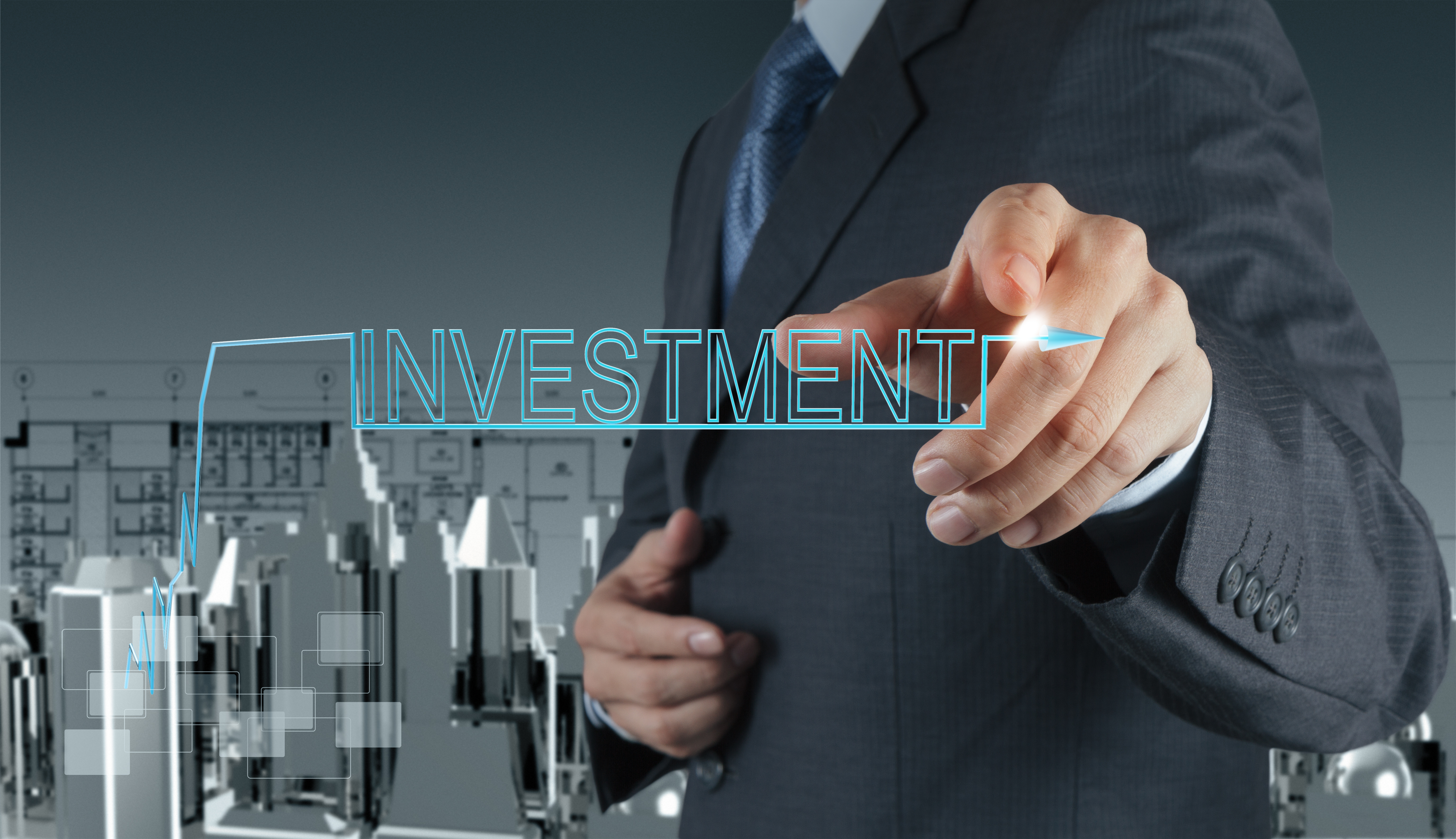 businessman pointing to investment concept
