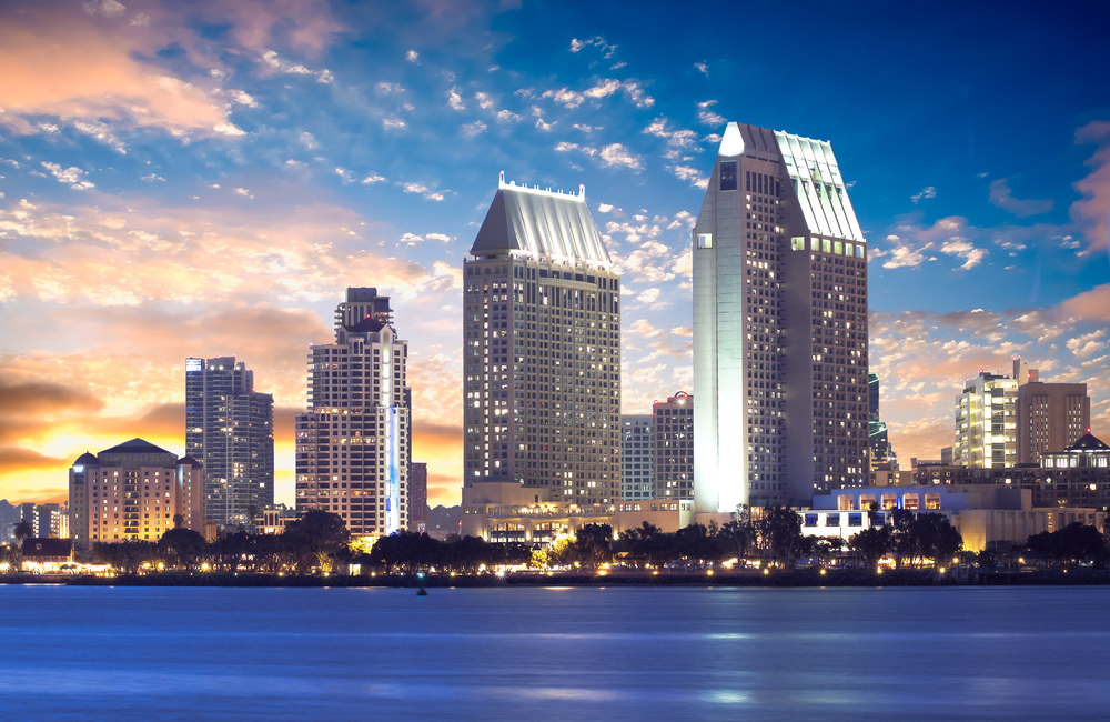 undervalued-real-estate San Diego skyline at dusk
